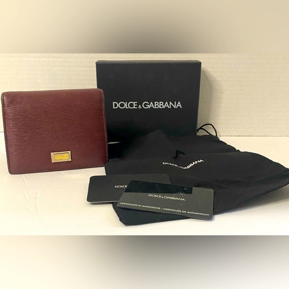 Dolce & Gabbana  burgundy 2 fold wallet with change section signature on front